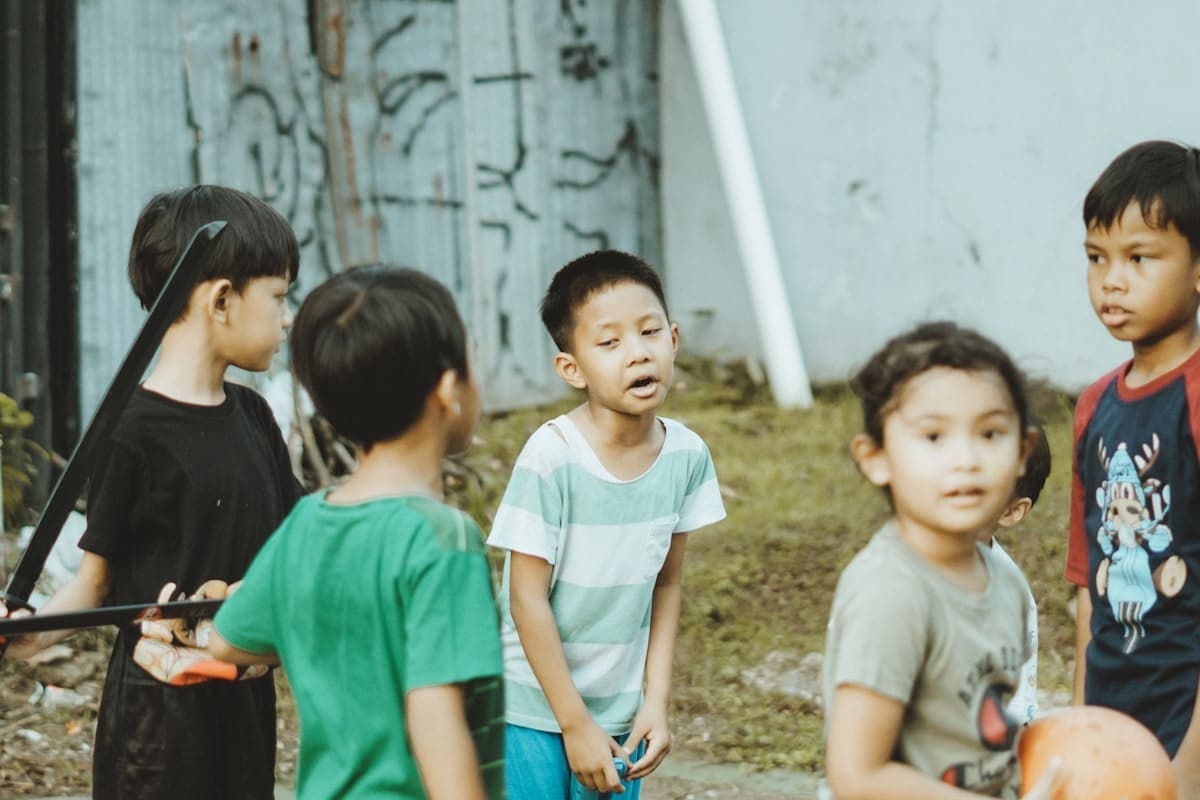 Children developing social skills through guided group play activities