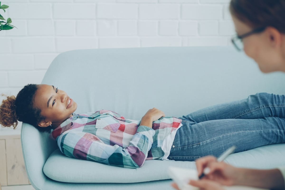 Therapist and child working together through structured ABA care steps